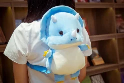 Sale La compagnie de la peluche Le bébé dinosaure - sac à dos en peluche