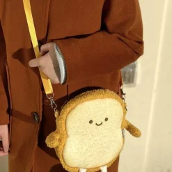 Online La compagnie de la peluche Le toast - sac à bandoulière en peluche