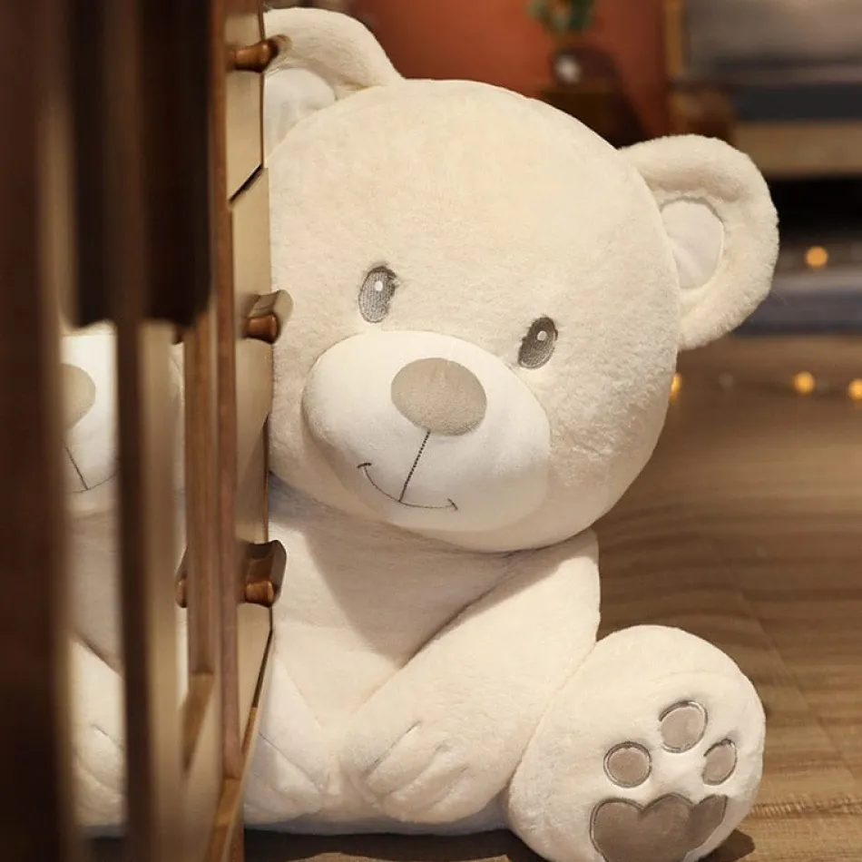 New La compagnie de la peluche L'ours en peluche aux pattes douces et câlines Blanc