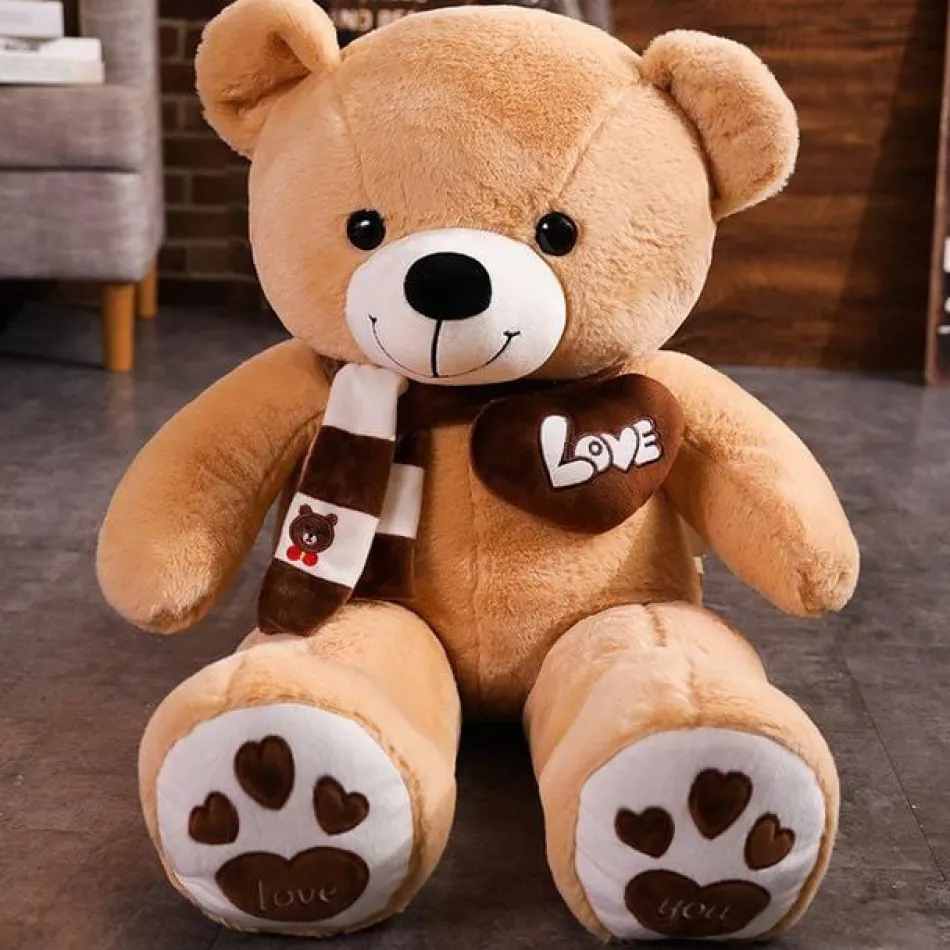 La compagnie de la peluche Ours en peluche mignon avec un cœur