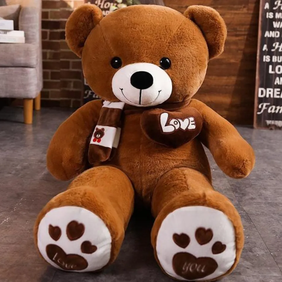 La compagnie de la peluche Ours en peluche mignon avec un cœur