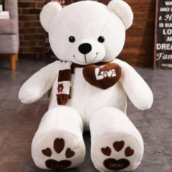 La compagnie de la peluche Ours en peluche mignon avec un cœur