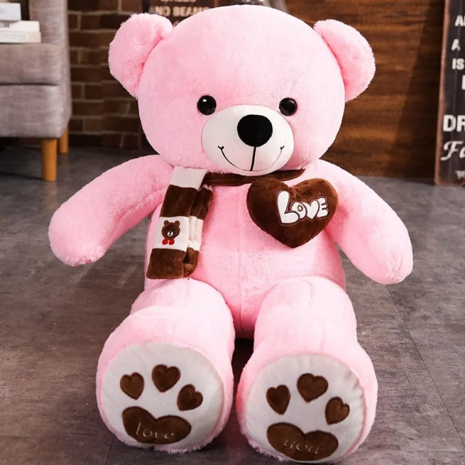 La compagnie de la peluche Ours en peluche mignon avec un cœur