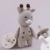 Sale La compagnie de la peluche Peluche crochet girafe timide