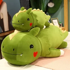 Discount La compagnie de la peluche Peluche dinosaure avec un cœur sur la joue