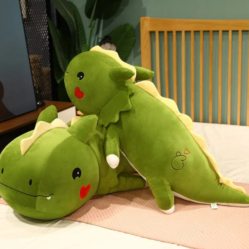 Discount La compagnie de la peluche Peluche dinosaure avec un cœur sur la joue