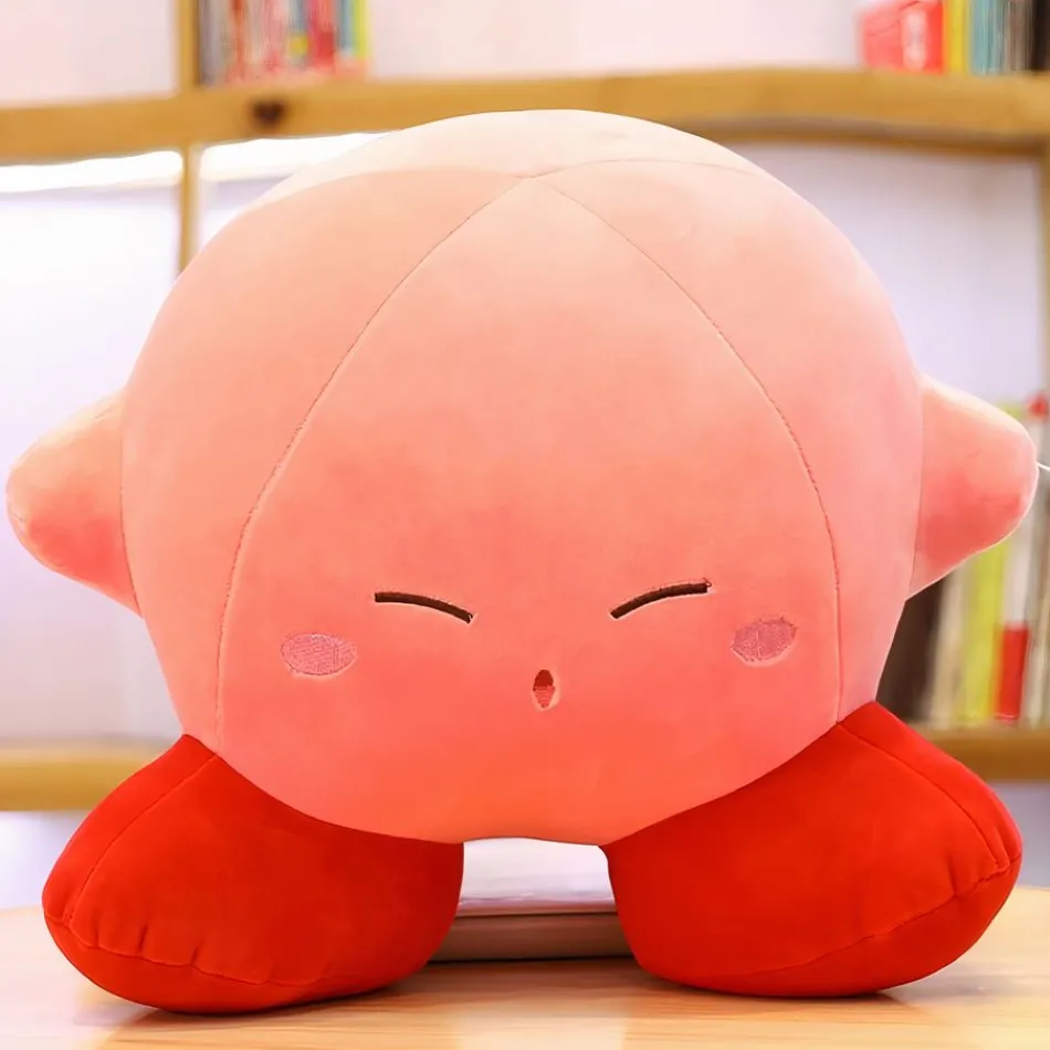 La compagnie de la peluche Peluche Kirby câlin doux tête baissée rose tendre