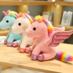 New La compagnie de la peluche Peluche licorne blanche à crinière arc-en-ciel magique