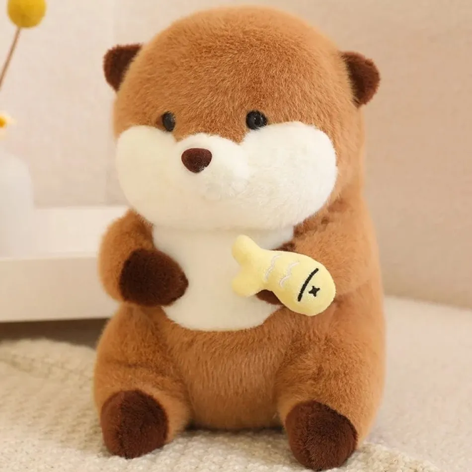 Discount La compagnie de la peluche Peluche loutre qui tient un poisson coloré