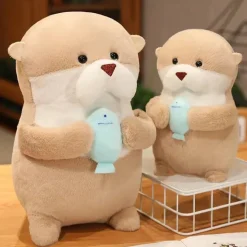 La compagnie de la peluche Peluche loutre tenant un poisson