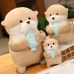 La compagnie de la peluche Peluche loutre tenant un poisson