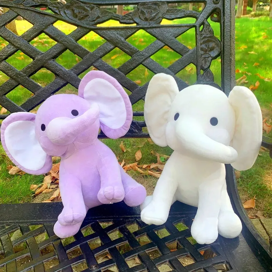 Online La compagnie de la peluche Peluche éléphant coloré avec sa trompe tordue