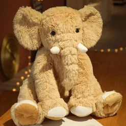 Online La compagnie de la peluche Peluche éléphant poilu aux petites défenses