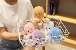 La compagnie de la peluche Peluche pieuvre contente et colorée