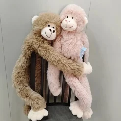 New La compagnie de la peluche Peluche singe à câlins