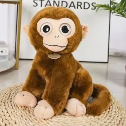 Discount La compagnie de la peluche Peluche singe bavard et expressif