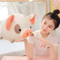 La compagnie de la peluche Peluche squishmallow cochon blanc mignon