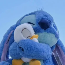 Clearance La compagnie de la peluche Peluche stitch bleu doux câlinant un ami