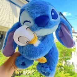 Clearance La compagnie de la peluche Peluche stitch bleu doux câlinant un ami