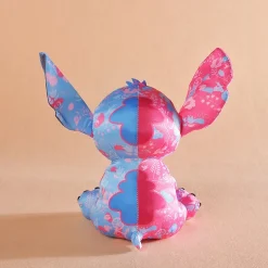 La compagnie de la peluche Peluche Stitch Disney rose bleu clair enfant câlin doux