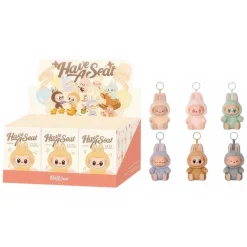 Online La compagnie de la peluche Peluche type Labubu assise boîte mystère