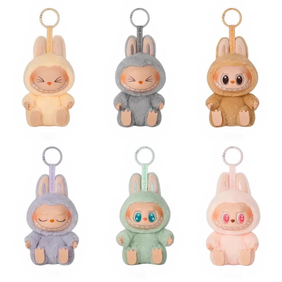 Online La compagnie de la peluche Peluche type Labubu assise boîte mystère