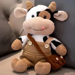 La compagnie de la peluche Peluche vache en salopette