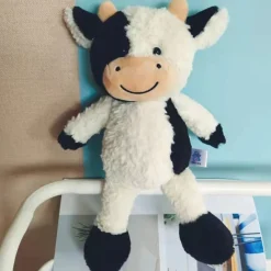 Sale La compagnie de la peluche Peluche vache mignonne à fourrure blanche